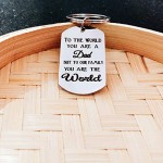 TOWSIX Dad Gifts from Son Daughter Stainless Steel Keychain Fathers Day Gift Birthday Christmas Gifts for Men (To the World You Are a Dad But to Our Family You Are the World) Silver Medium